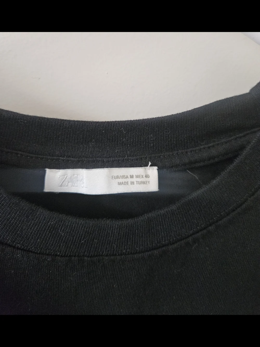 Zara Black Short-Sleeve Tee with Small White Chest Graphic - Picture 6 of 12